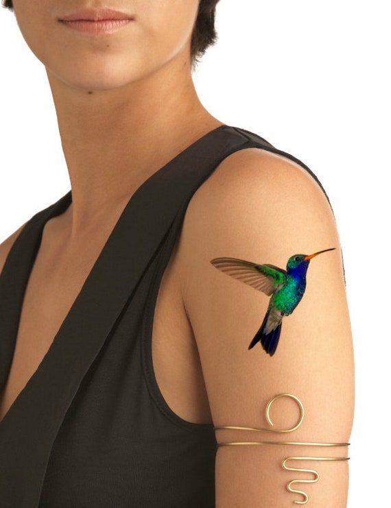 Lovely Colorful Bird Tattoo Idea