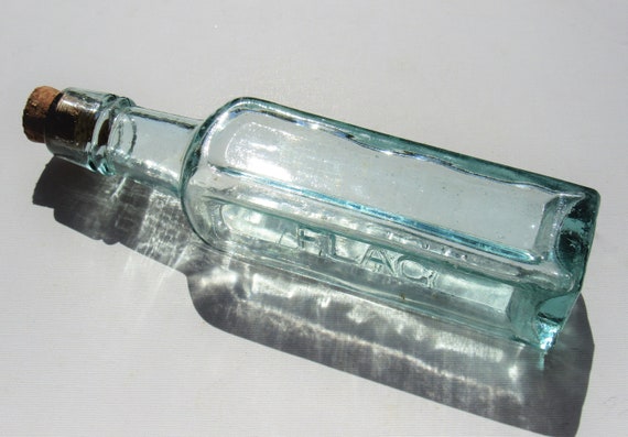 Bottiglia piccola in vetro base quadrata e tappo in sughero 125ml