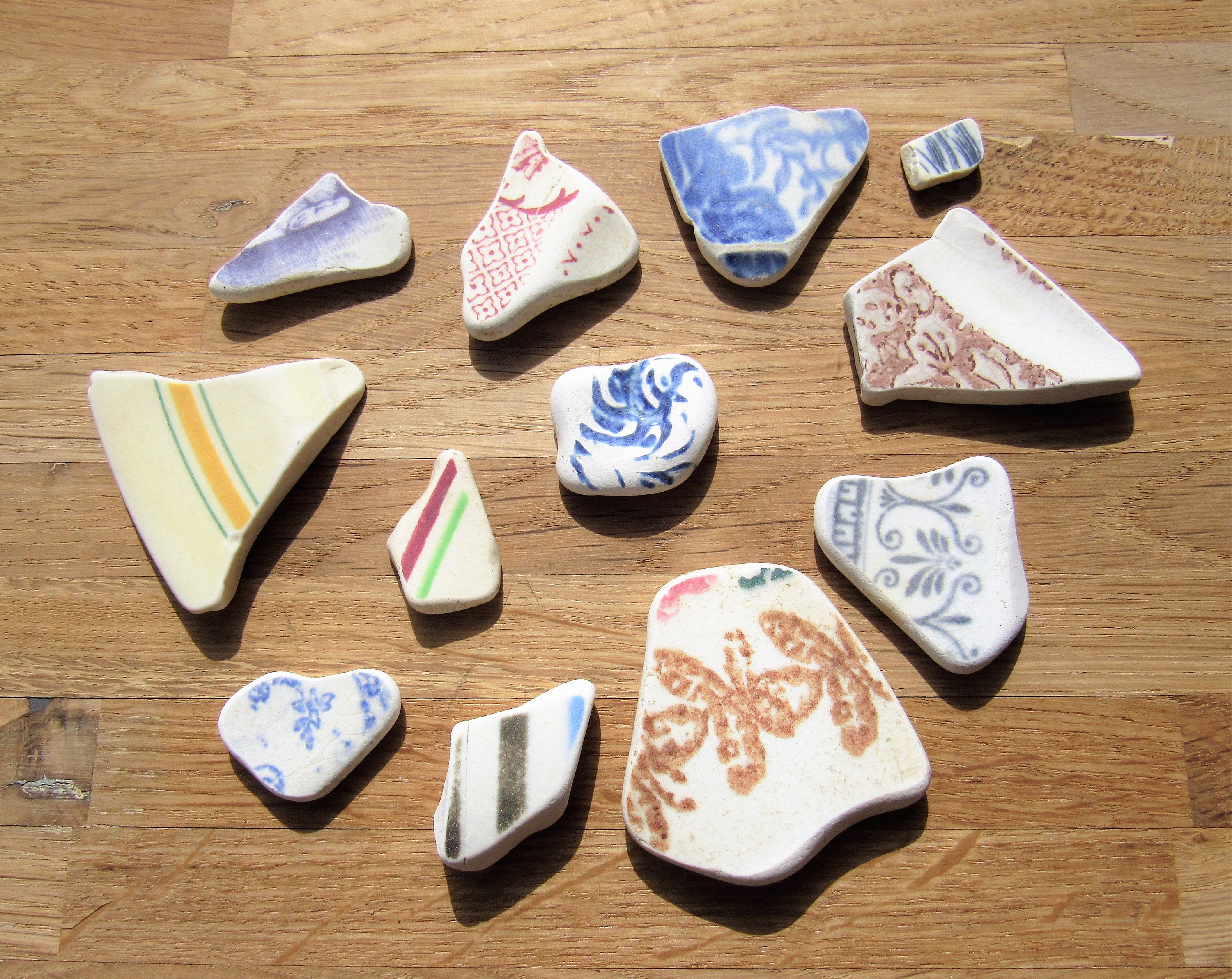 Earthsea Pottery - Peggy's wax resist with ocean colors
