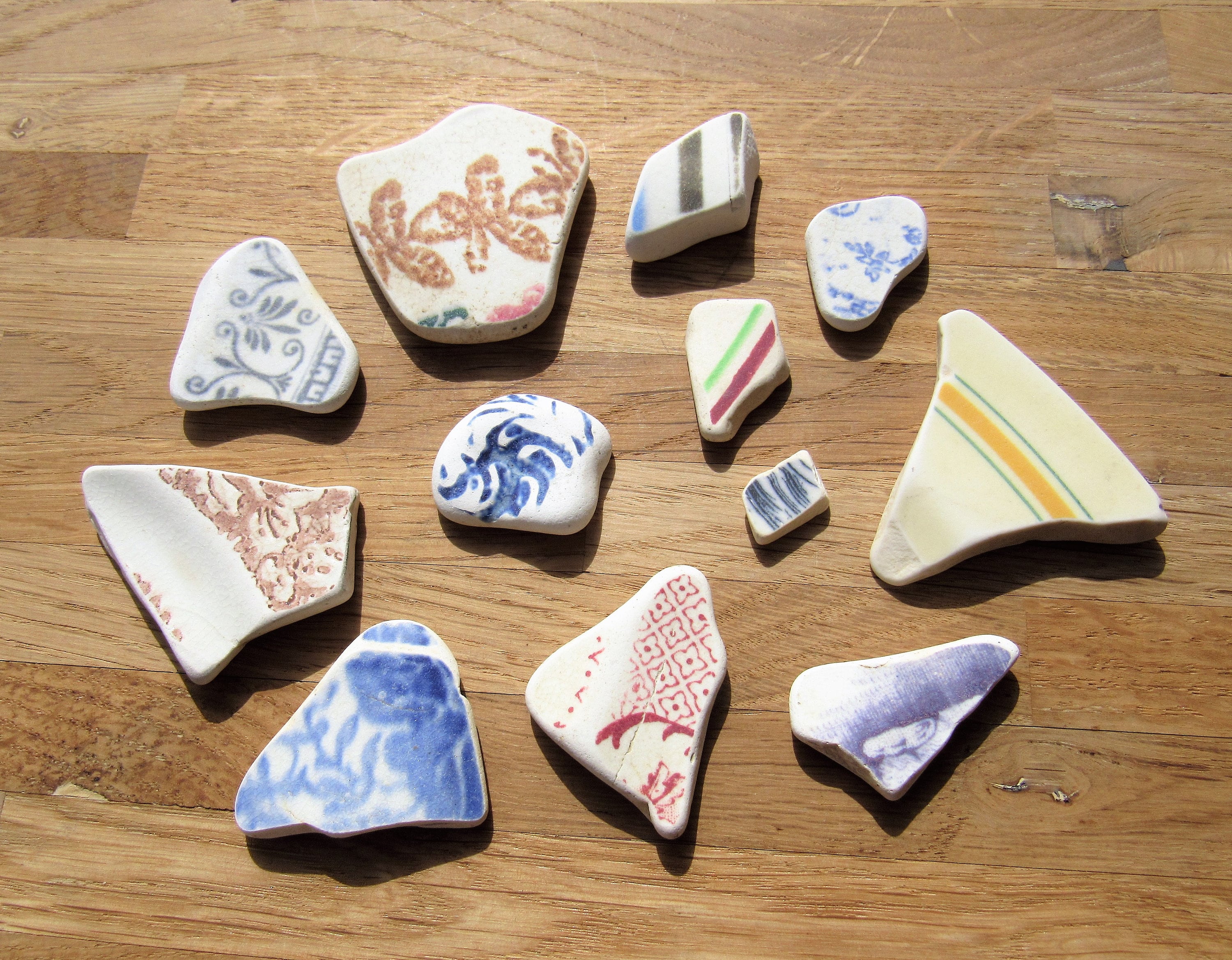 Earthsea Pottery - Peggy's wax resist with ocean colors