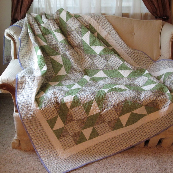 Calming quilt made of fabrics in Violet Stripe, Mottled Green and Cream, 61x85 inches