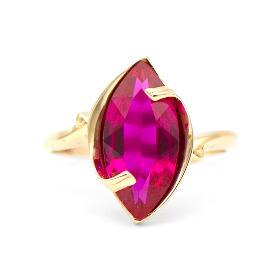 10k Yellow Gold Synthetic Red Stone Ring - image 1