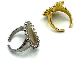 Anillo llamativo con diseño de rayos de sol en plata de ley y baño de oro de 14 k.