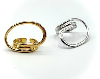 Anillo con diseño de lazo característico: plata de ley y baño de oro