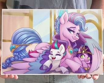 May include: A rectangular print featuring a cartoon illustration of three colorful ponies. The ponies are primarily pink, purple, and blue, with wings and jewel accents. The artwork has a soft, pastel color palette and a friendly, inviting style.