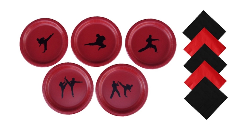 May include: Set of six red paper plates with black silhouettes of martial arts figures. The plates are 9 inches in diameter. Also included are five black napkins with red accents.