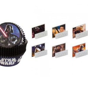 May include: Star Wars cupcake liners with Darth Vader and a lightsaber on the front. The liners are black with a blue and white border. There are also six silver cupcake toppers with different Star Wars characters and the words "Star Wars" on them.