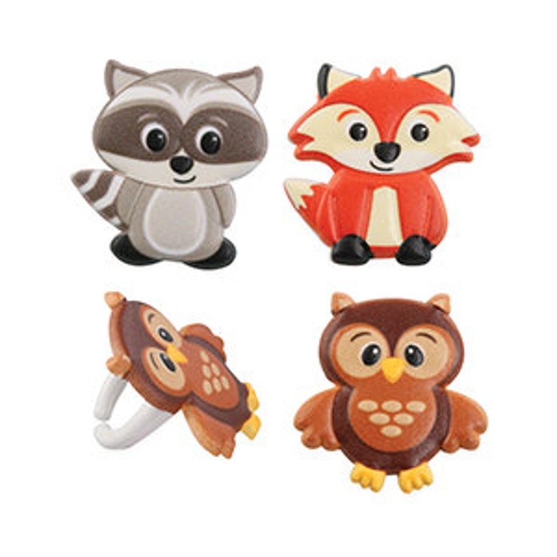 May include: Set of four colorful cartoon animal cake toppers. The toppers feature a raccoon, a fox, and two owls. The raccoon is gray with a black mask, the fox is orange with a white chest, and the owls are brown with yellow feet.