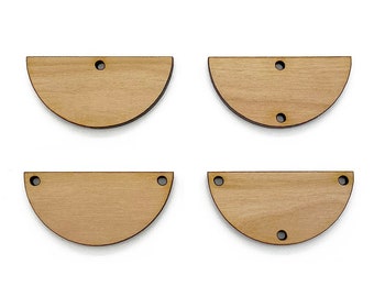 May include: Four unfinished wooden half-circle shapes with holes for hanging. The shapes are light brown and have a smooth surface.