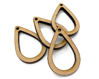 May include: Four unfinished wooden teardrop shapes with a hole at the top. These teardrop shapes are perfect for crafting projects.
