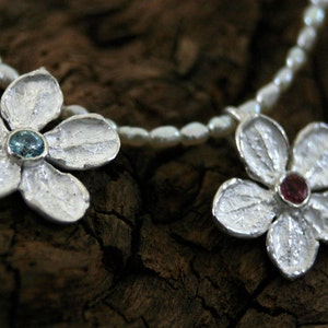 Flower pendant with topaz or garnet 925 silver
