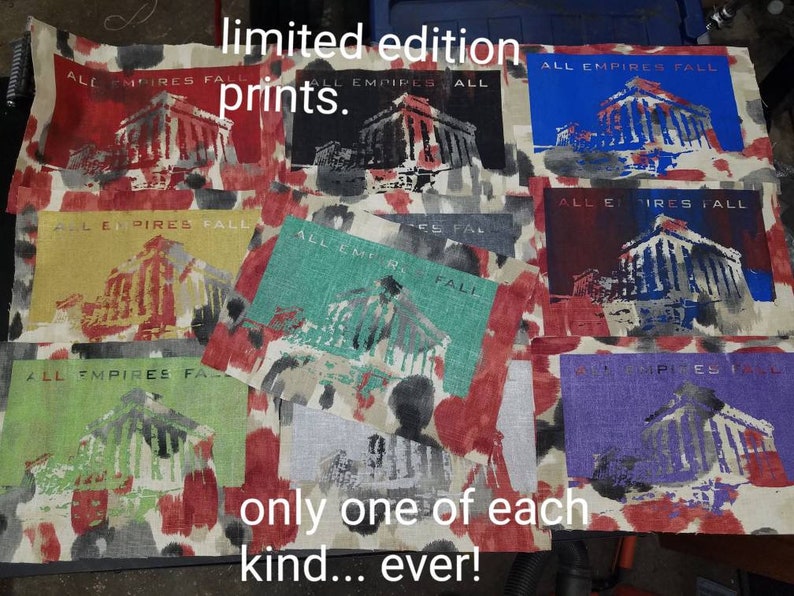 May include: Nine limited edition prints of a building with the text "All Empires Fall" in different colors. The prints are on a red, white, and black patterned fabric. The text "limited edition prints" and "only one of each kind... ever!" is also visible.