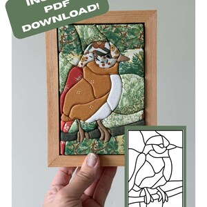 May include: A fabric mosaic art piece in a light wood frame depicting a bird perched on a branch, featuring patterned textiles in shades of green, brown, and white. The text INSTANT PDF DOWNLOAD appears in a green box. A black and white line drawing template is included.