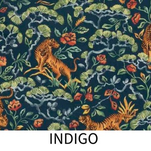 May include: Indigo blue fabric with a repeating pattern of tigers, flowers, and pine trees. The tigers are orange and black with white stripes.