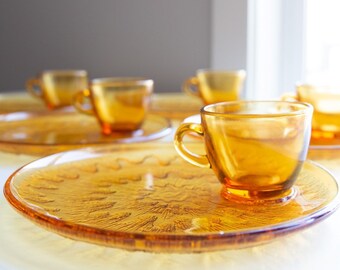 Six Amber Glass Teacup and Plate Set