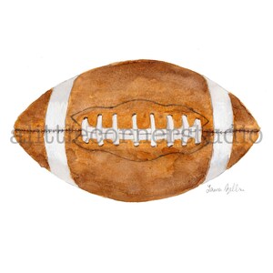 May include: A watercolor painting of a brown and white football. The football has white laces and a white stripe around the middle.