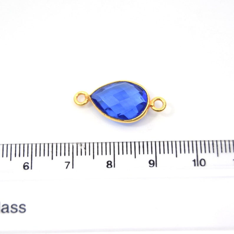 Measuring 9mm x 13mm Gold Plated Faceted Hydro Sold Individually Lab Created Transparent Cobalt Teardrop Shaped Bezel Connector