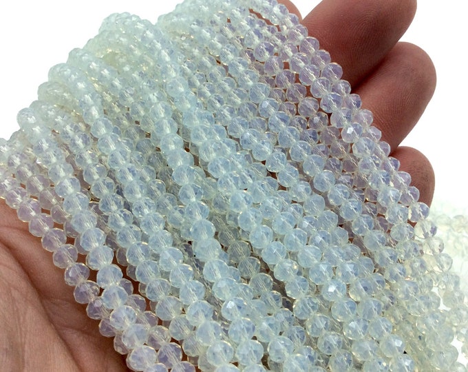 Chinese Crystal Beads | 4mm Glossy Finish Faceted Transparent Pale Celery Green Crystal Rondelle Shaped Glass Beads