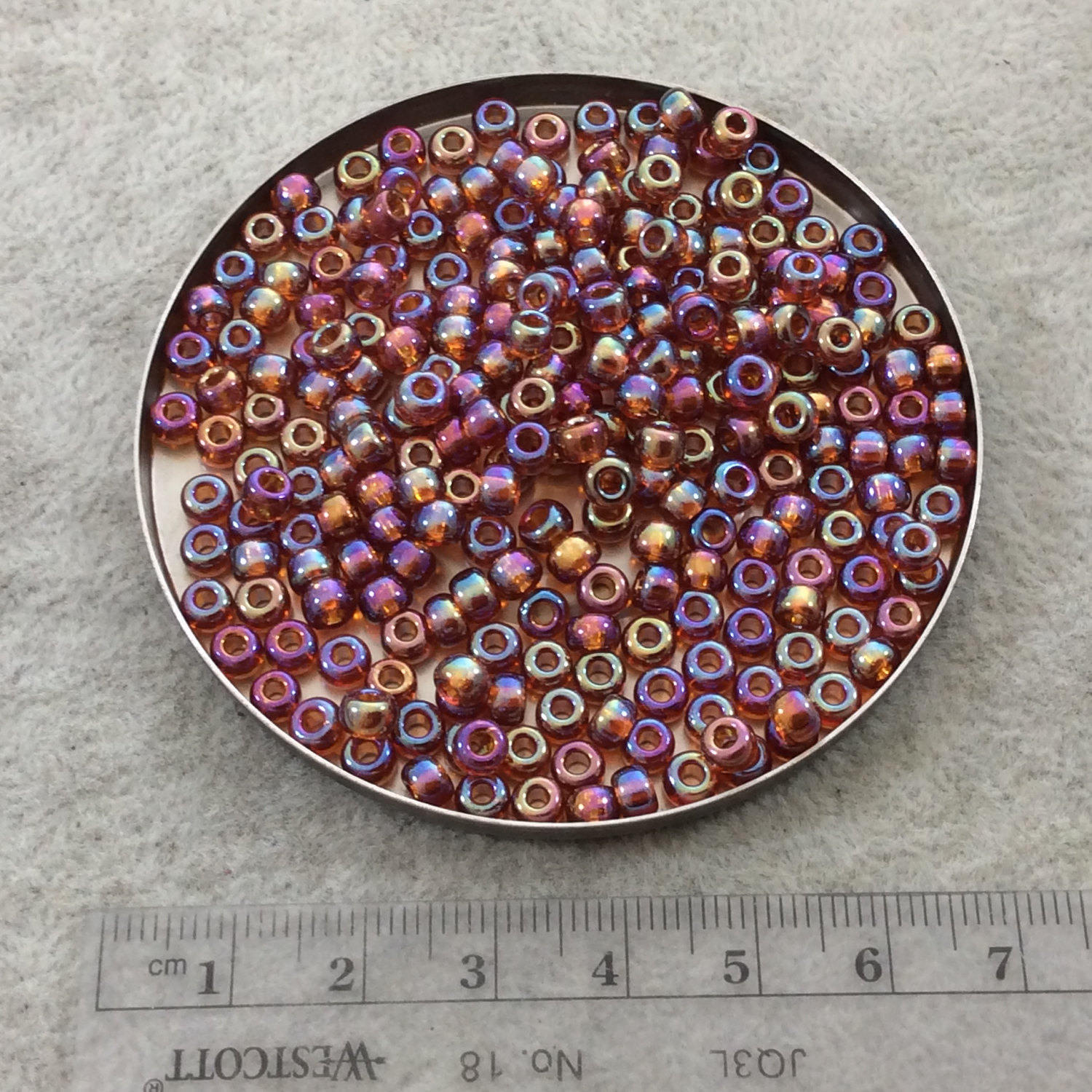 Size 6/0 AB Finish Trans. Dark Topaz Genuine Miyuki Glass Seed Beads - Sold by 20 Gram Tubes (Approx. 200 Beads per Tube) - (6-9257) Size 6/0 AB Finish Trans. Dark Topaz Genuine Miyuki Glass Seed Beads - Sold by 20 Gram Tubes (Approx. 200 Beads per Tube) - (6-9257)
