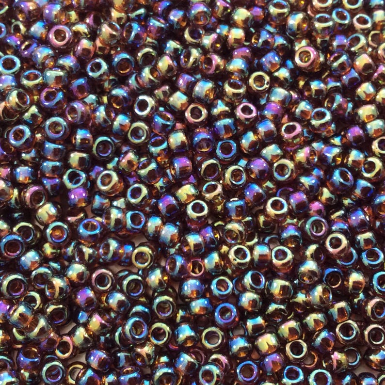 - Sold by 22 Gram Tubes 8-9257 Size 80 Glossy AB Finish Transparent Topaz Genuine Miyuki Glass Seed Beads Approx. 900 Beads per Tube