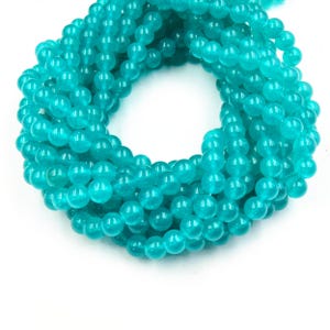 Perles de jade | Perles rondes lisses teintées, perles de pierres précieuses | Perles bleues, turquoise, vertes et blanches - Disponibles en 4 mm, 6 mm, 8 mm, 10 mm et 12 mm Turquoise