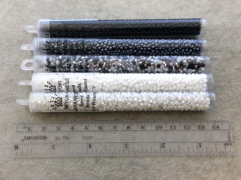 - Sold by 22 Gram Tubes 8-9257 Size 80 Glossy AB Finish Transparent Topaz Genuine Miyuki Glass Seed Beads Approx. 900 Beads per Tube