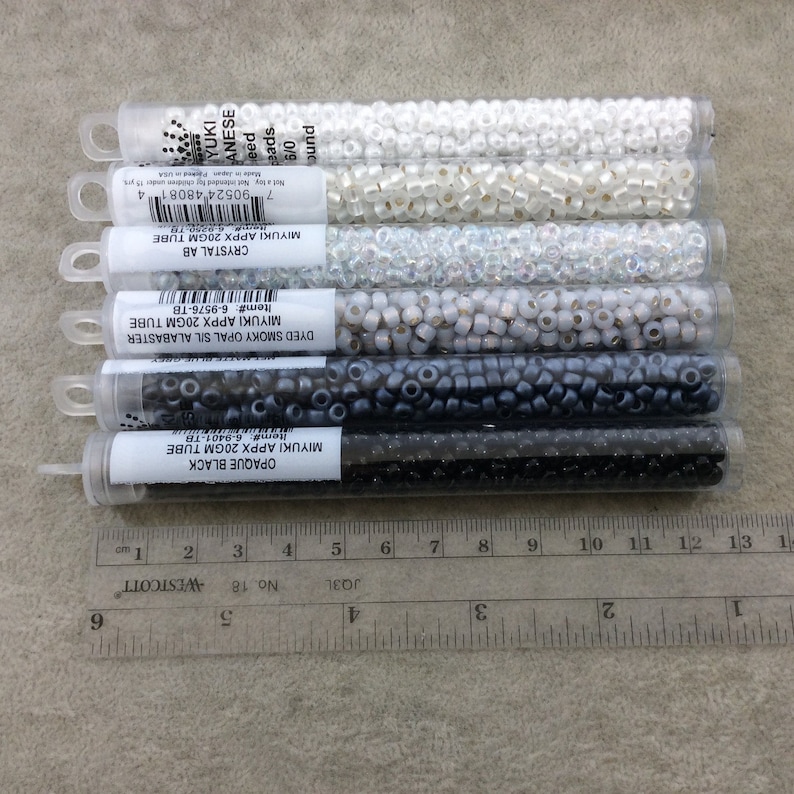 Miyuki 6/0 Rocailles – Transparent rökig ametist med glansig finish (20 grams tub) bild 3