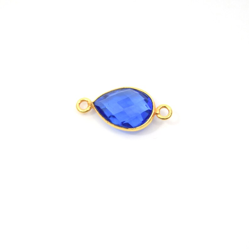 Measuring 9mm x 13mm Gold Plated Faceted Hydro Sold Individually Lab Created Transparent Cobalt Teardrop Shaped Bezel Connector