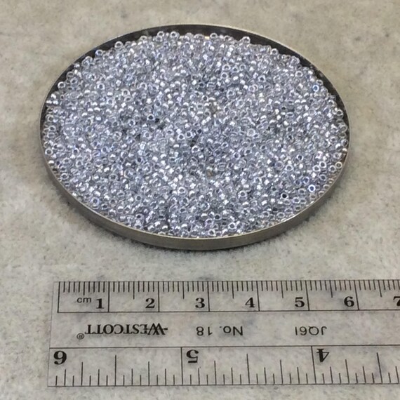 Size 11/0 Glossy Finish Sparkle Pewter-lined Crystal Color