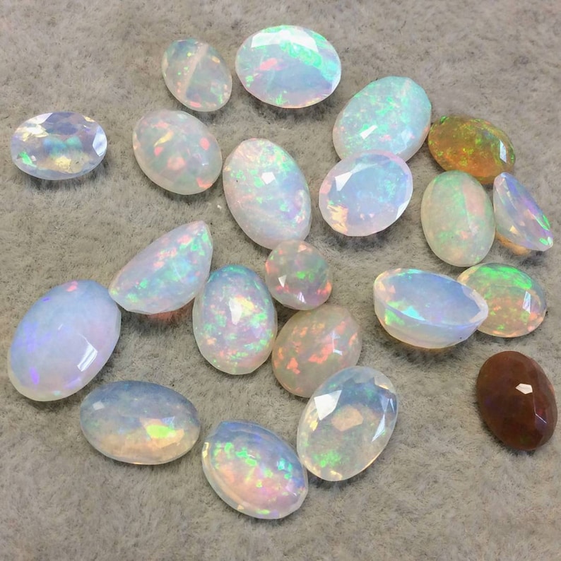 Top Measuring 8mm x 10mm with 4.5mm Pavillion 1.385 Carat Faceted Genuine Ethiopian Opal Oval Cut Stone F-S and 1mm Crown Base