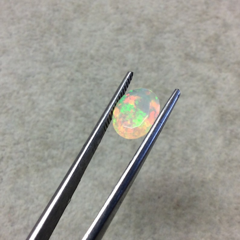 Top Measuring 8mm x 10mm with 4.5mm Pavillion 1.385 Carat Faceted Genuine Ethiopian Opal Oval Cut Stone F-S and 1mm Crown Base
