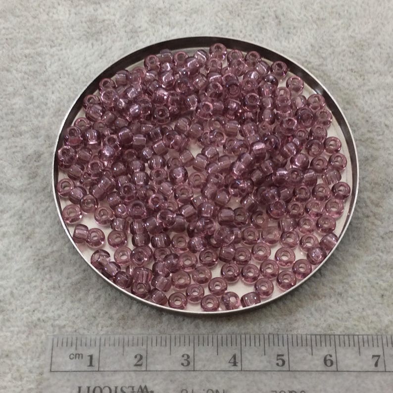 Miyuki 6/0 Rocailles – Transparent rökig ametist med glansig finish (20 grams tub) bild 2