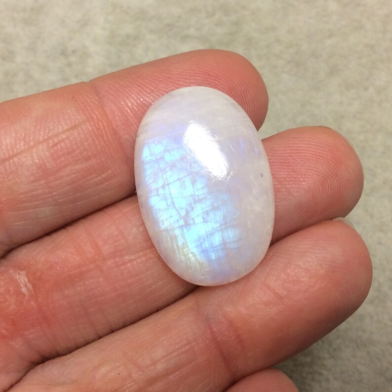 Measuring 18.5mm x 27mm OOAK Single AAA Oval Shaped Iridescent AquaBlue Moonstone Flat Back Cabochon Gemstone Cab 7mm Dome Height
