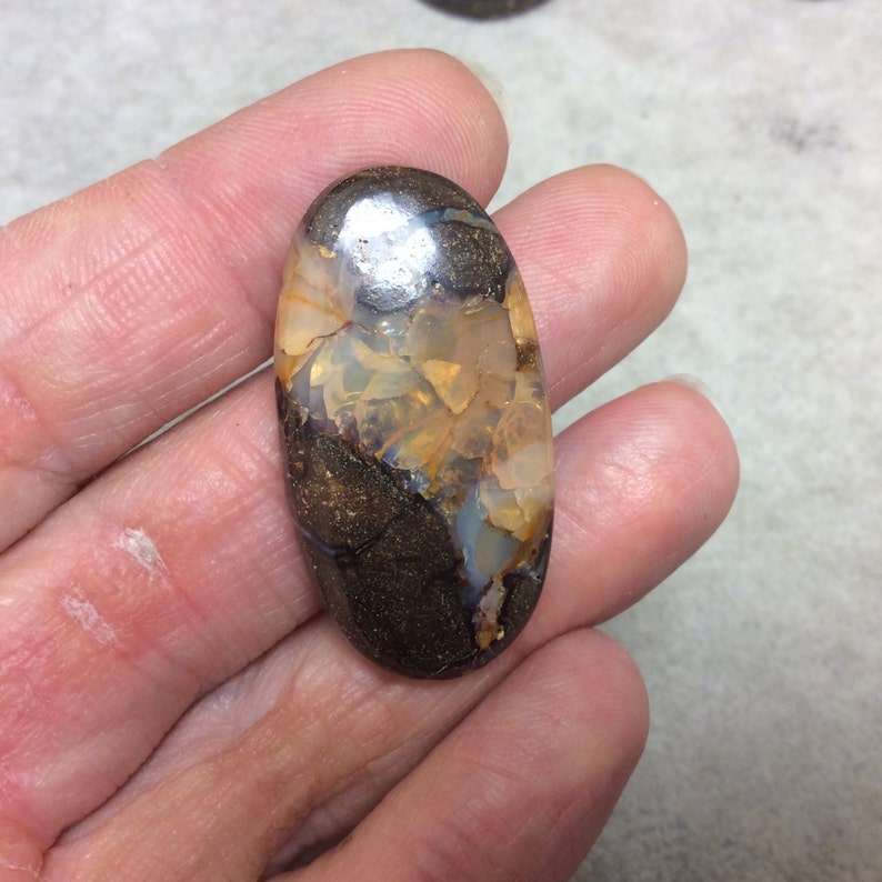 Natural High Quality Gemstone OOAK Oval Shaped Australian Boulder Opal Flat Back Cabochon Measuring 21mm x 39mm 6mm Dome Height