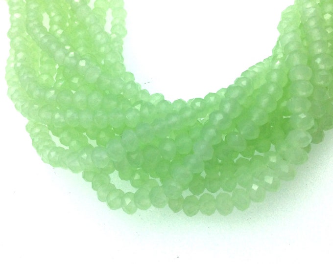 Chinese Crystal Beads | 4mm Faceted Opaque Pale Mint Green Rondelle Shaped Glass Beads