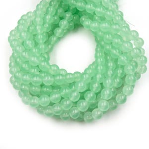 Perles de jade | Perles rondes lisses teintées, perles de pierres précieuses | Perles bleues, turquoise, vertes et blanches - Disponibles en 4 mm, 6 mm, 8 mm, 10 mm et 12 mm Mint Green