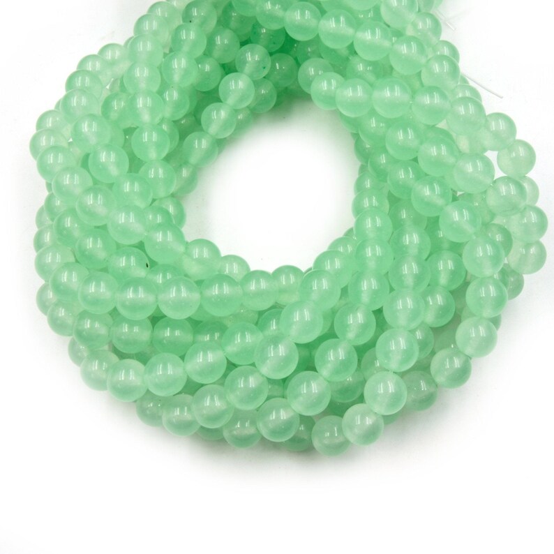 Perles de jade | Perles rondes lisses teintées, perles de pierres précieuses | Perles bleues, turquoise, vertes et blanches - Disponibles en 4 mm, 6 mm, 8 mm, 10 mm et 12 mm Mint Green