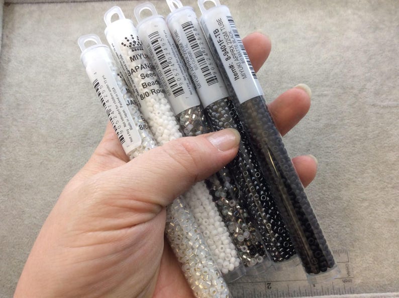 - Sold by 22 Gram Tubes 8-9257 Size 80 Glossy AB Finish Transparent Topaz Genuine Miyuki Glass Seed Beads Approx. 900 Beads per Tube