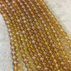 Deep Yellow Crystal Beads: 6mm Pearlescent Round Glass Beads