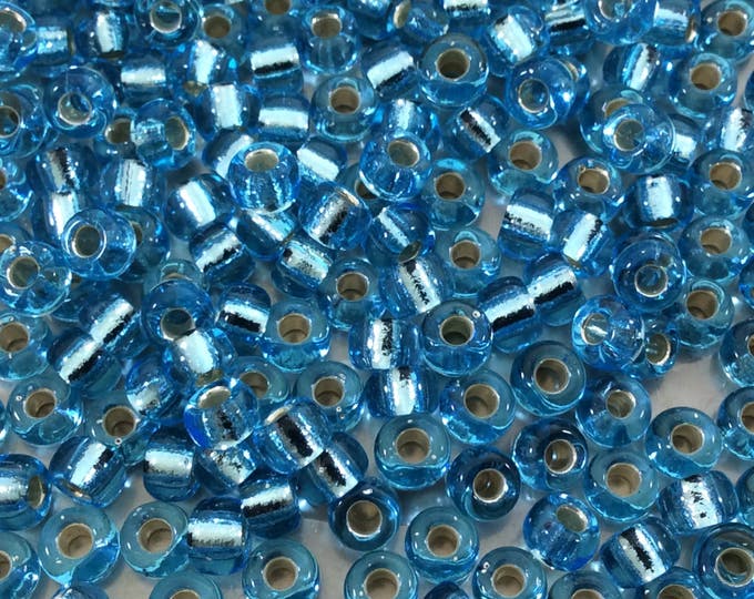 Size 6/0 Gloss Finish Silver Lined Aqua Genuine Miyuki Glass Seed Beads - Sold by 20 Gram Tubes (Approx. 200 Beads per Tube) - (6-9148S)