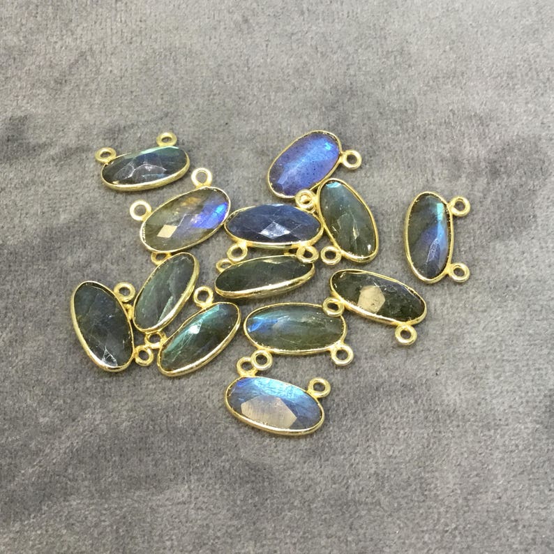 Gold Plated Copper Faceted Natural Labradorite Faceted Oval Shaped Bezel Pendant with Two Top Rings Measuring 14mm x 7mm