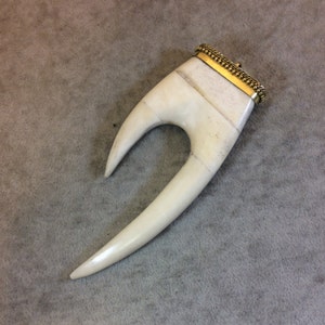 Measuring 45mm x 70mm TR275WBNFA Approximately - 2.75 Warm Brown Notched Arrow Shaped Natural Ox Bone Pendant with Dotted Gold Cap