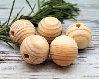 Perles ronde bois naturel rayé 20 mm