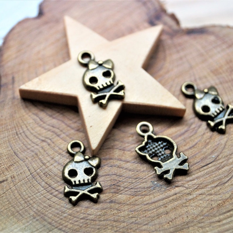 Skull charms metal 2011 mm Bronze