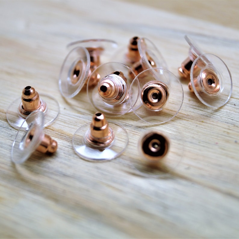 Fermoirs boucles d'oreilles silicone transparent et métal 11 mm Plastique/doré Rose