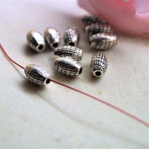 Perles en métal ovales rayées argentées 96 mm image 6
