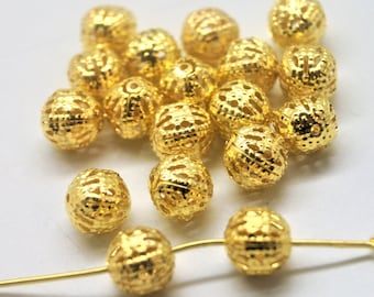 Perles 8 mm dorées en filigrane