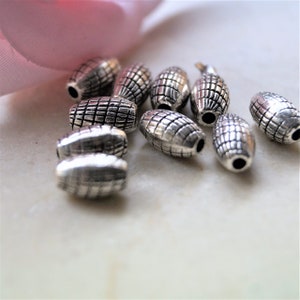 Perles en métal ovales rayées argentées 96 mm image 8