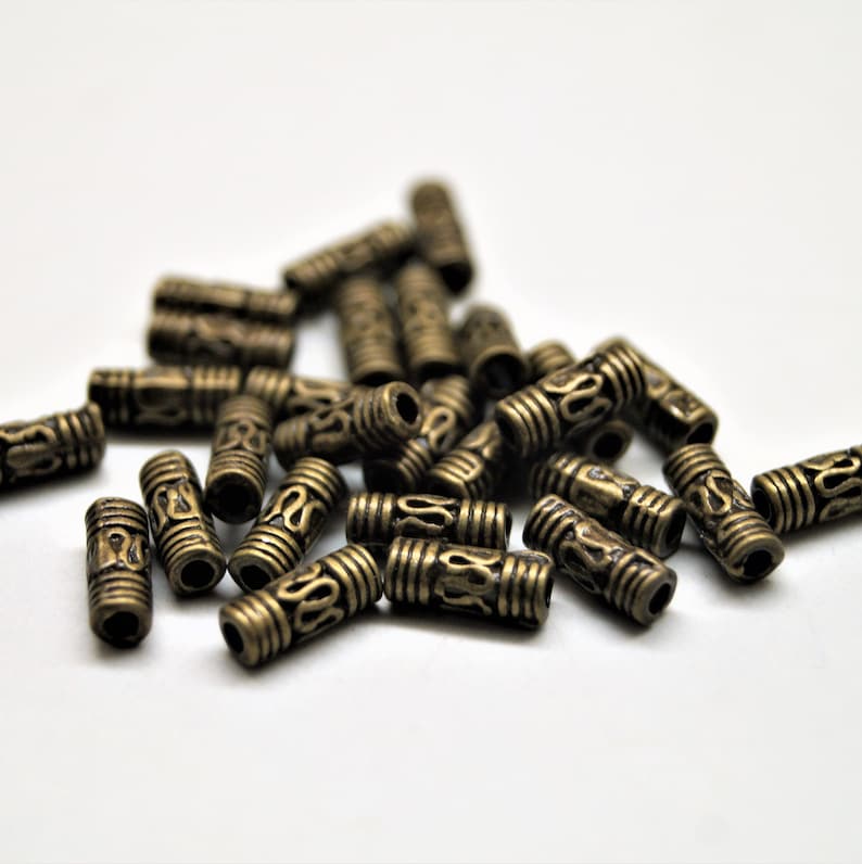 Perles métal tubes 83 mm par 20 Bronze
