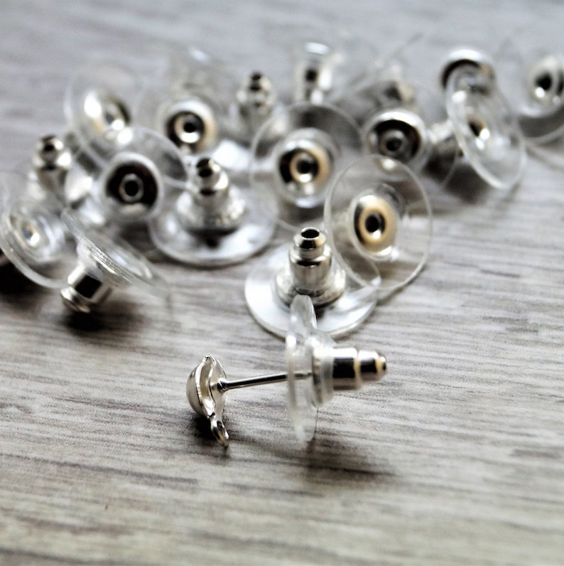 Fermoirs boucles d'oreilles silicone transparent et métal 11 mm Plastique/rhodium